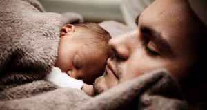 baby and dad sleeping